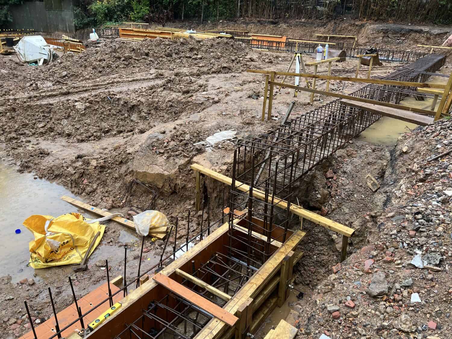 Rebar capping beam in place on a construction site, showing early stages of building development, it shows structural engineering a form of civil engineering